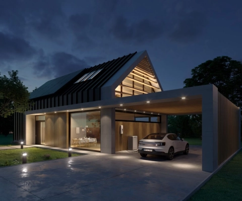 Ain autonomes Haus mit Carport, Elektroauto und Ladestation.